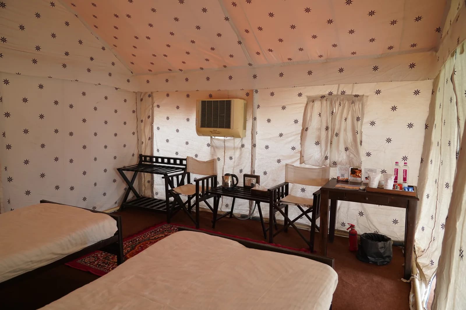Deluxe AC Swiss Cottage interior with air conditioning at Dhordo Tent City