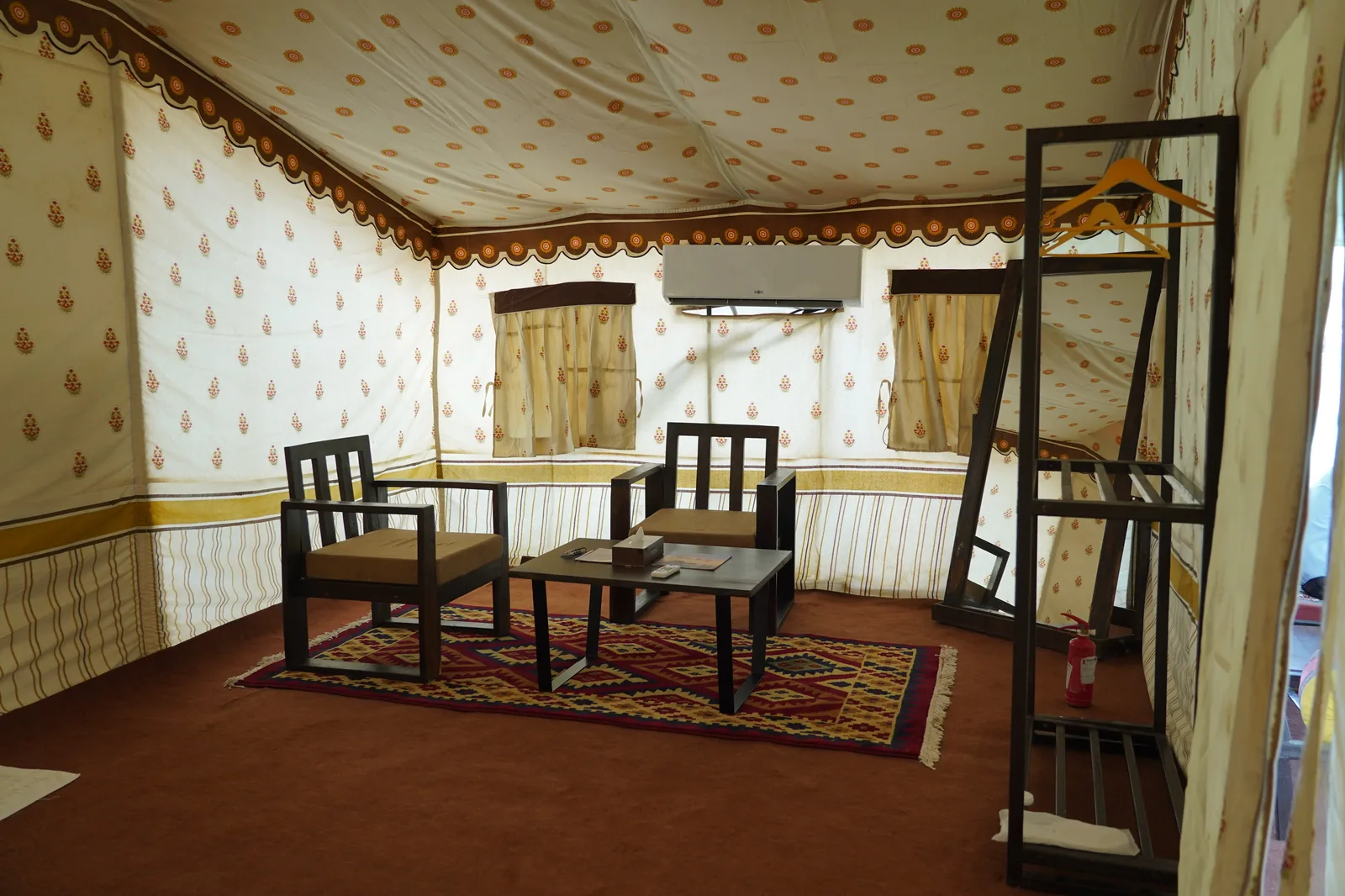 Premium Tent interior sitting area with block-print décor at Dhordo Tent City