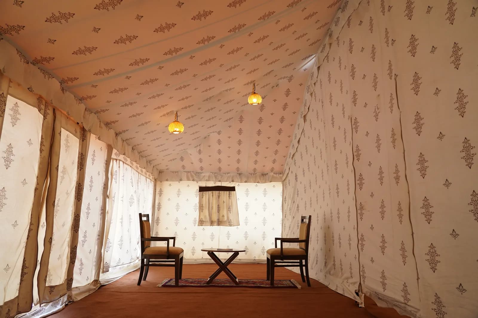 Rajwadi Suite sitting lounge with ornate lanterns