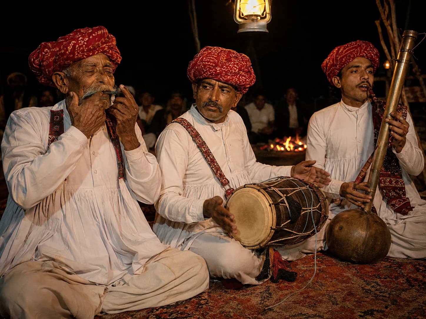 Kutchi folk musicians performing under lantern light at Rann Utsav Dhordo cultural evening